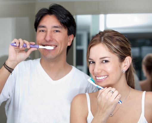 Gum Disease - Couple Brushing